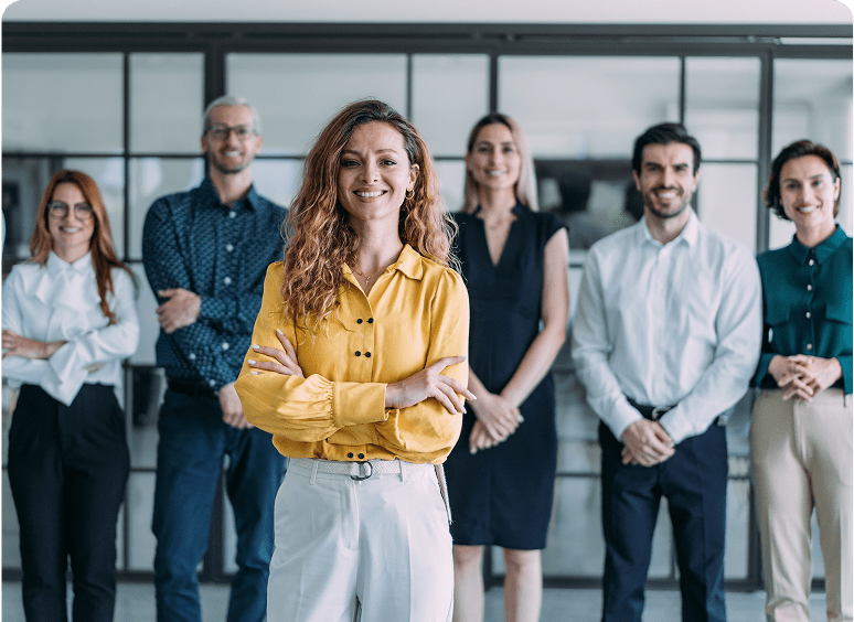 Team of professionals posing confidently