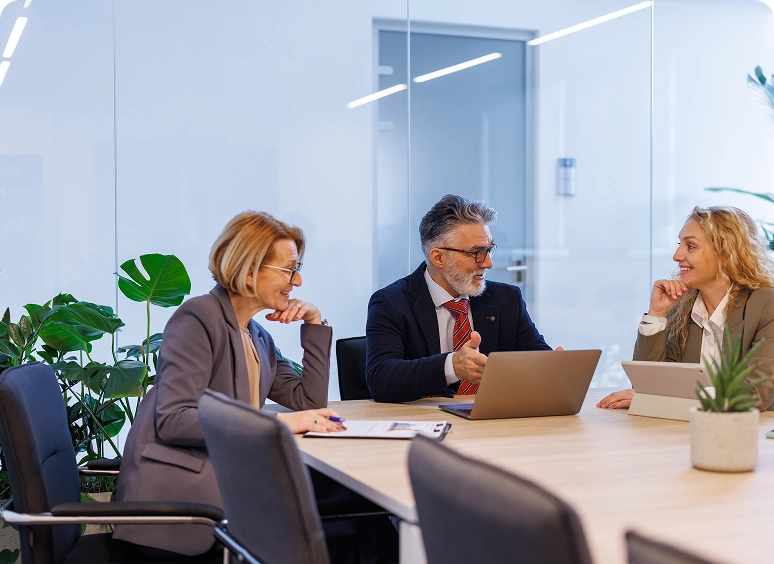 Professionals collaborating in modern office