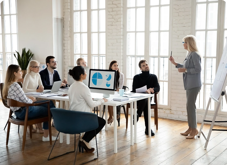 Professional woman leading office meeting
